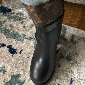 LV booties. Black leather with monogram